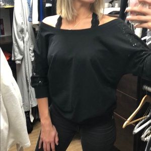 Black off the shoulder sweater.